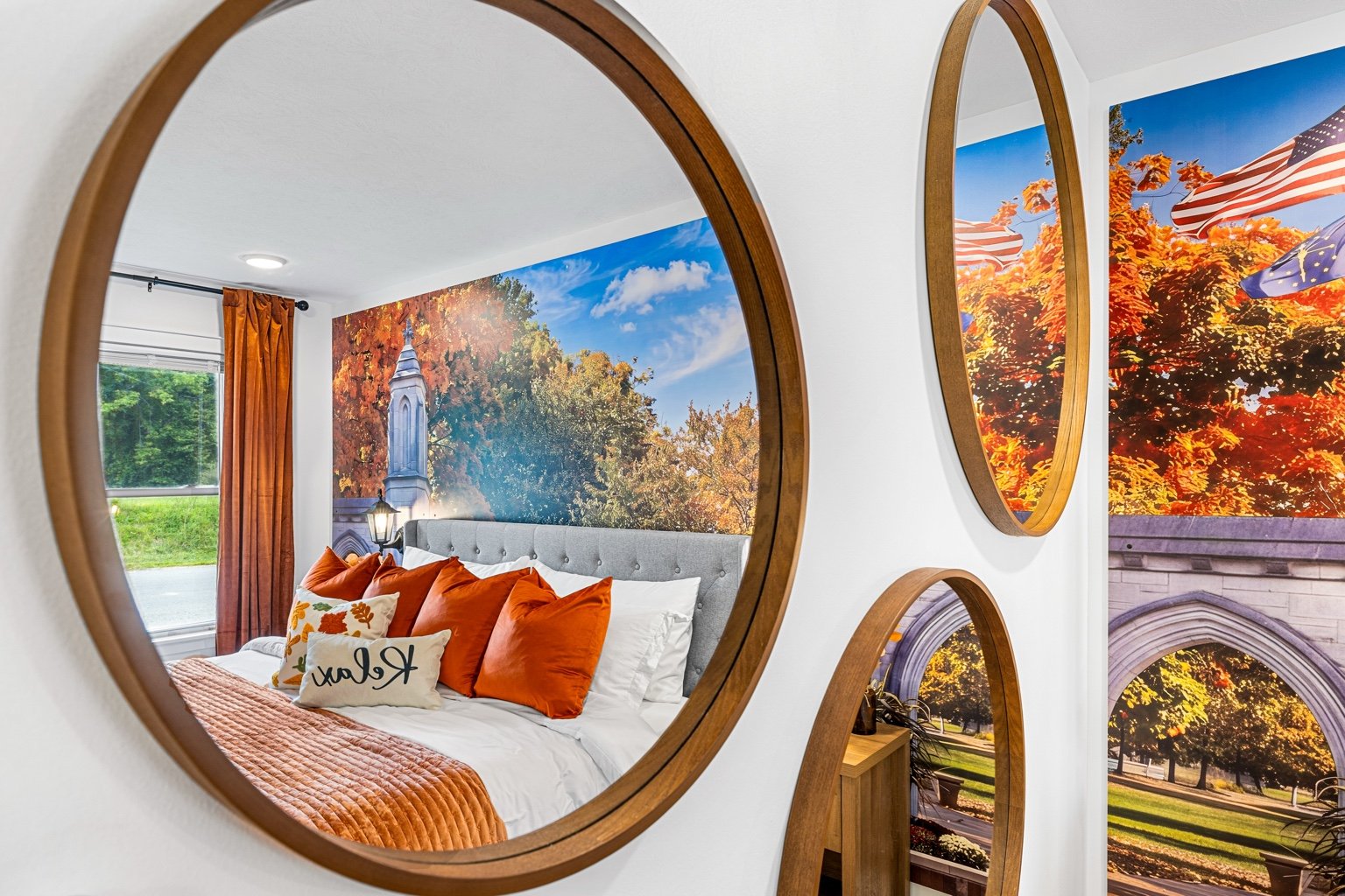 Vacation rental bedroom detail reflected in decorative mirrors photographed by Pic Me STR Photography